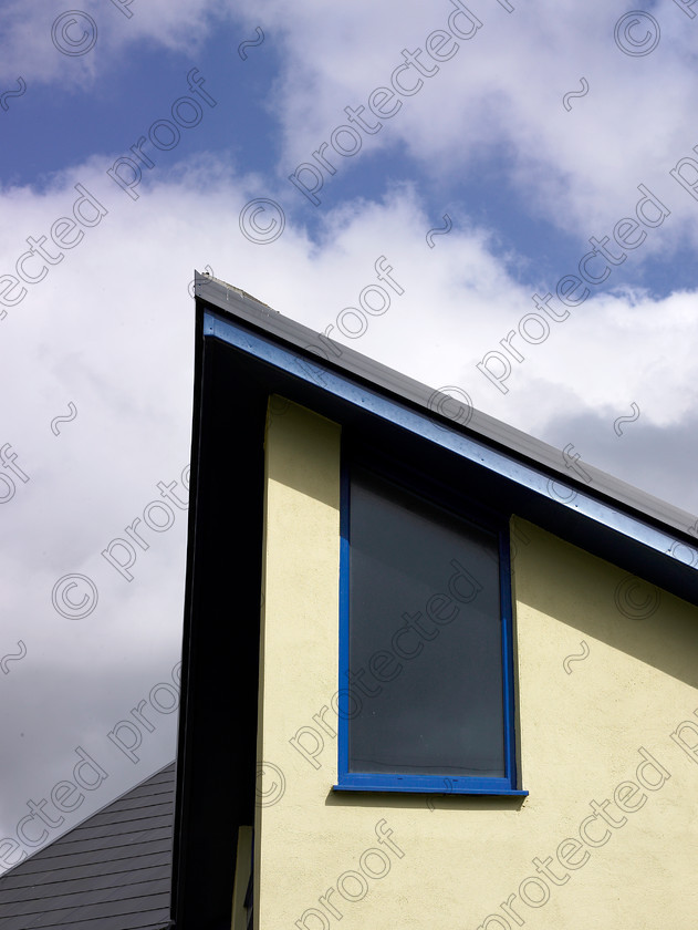 Kent coast-006 
 Detail of modern house. 
 Keywords: modern, building, window, roof, angles, blue, house, building, detail, glass