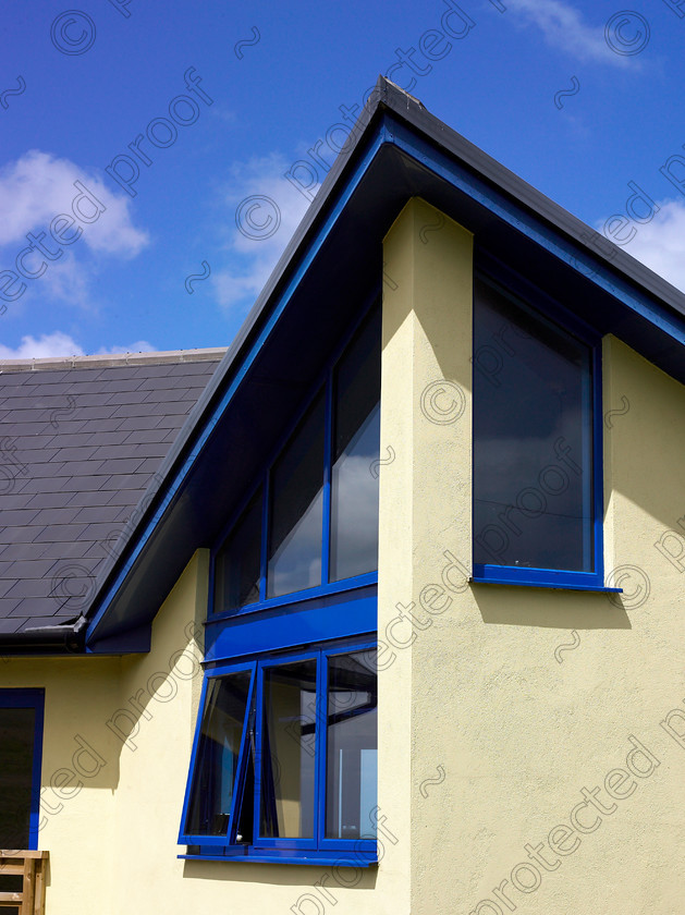 Kent coast-010 
 Detail of modern house. 
 Keywords: Modern, building, blue, roof, windows, angles, house, building, detail, glass