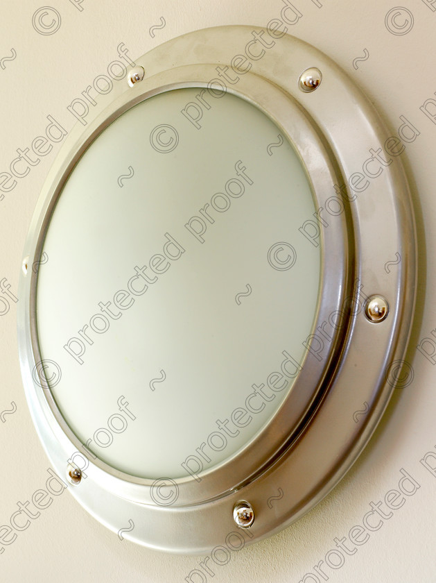 Kent coast-014 
 Porthole light. 
 Keywords: light, porthole, modern,